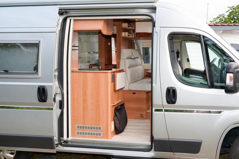 camper with open door ready for rv camping